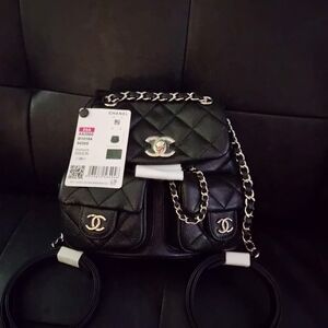 Chanel Black Quilted Backpack with Gold Accents